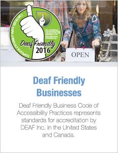 Deaf Friendly Businesses: Picture of a young woman in the window holding an Open Sign. A circle with a thumb print, "Deaf Friendly 2016"