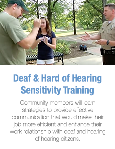 Deaf and Hard of Hearing Sensitivity Training: Picture of a policeman talking and a little girl signing to an older gentleman. 